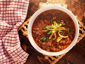 bowl of chili overhead shot with copy space
